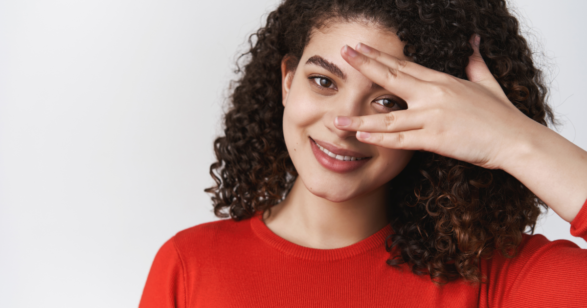 Woman showing healthy eyes