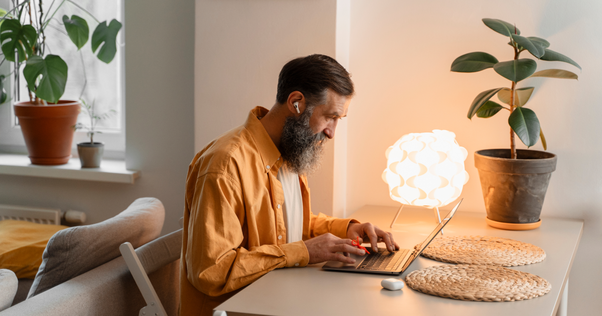 Woman using a laptop under proper lighting