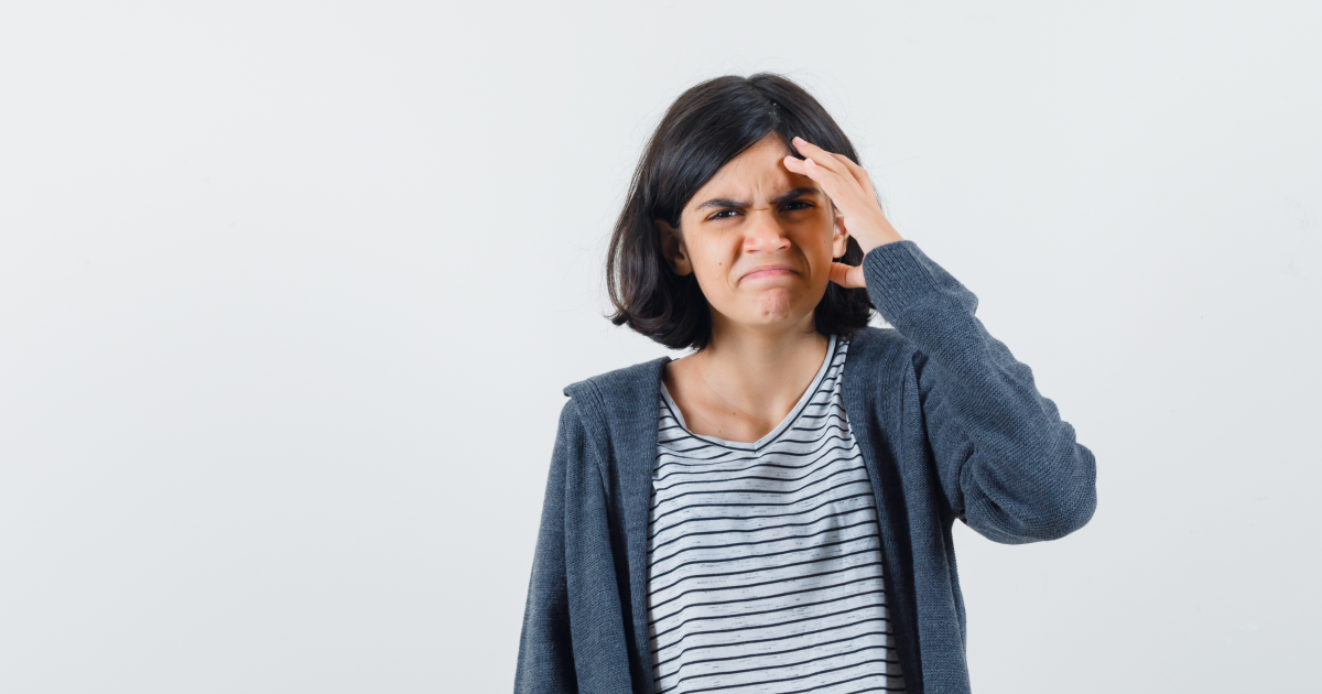 Women struggling to read an eye chart