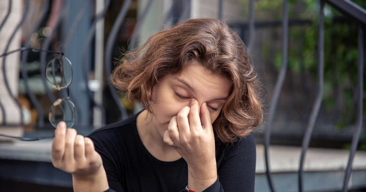 Woman with irritated eyes